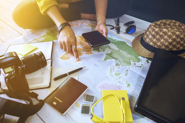 high-angle-view-people-using-laptop-table_1048944-29422334